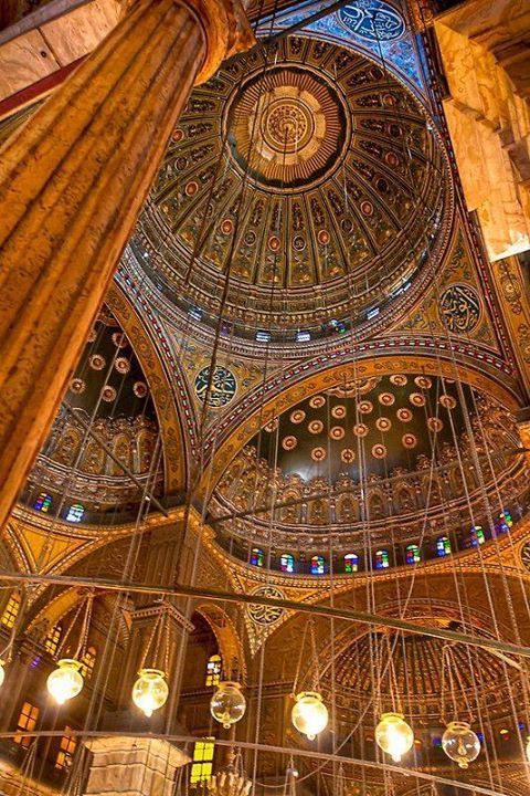 Ornate gilded dome and interior of a historic Cairo mosque